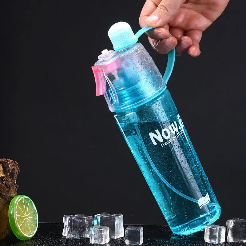 Portable green outdoor mist spray cup with handle, scale, and leakproof pad.