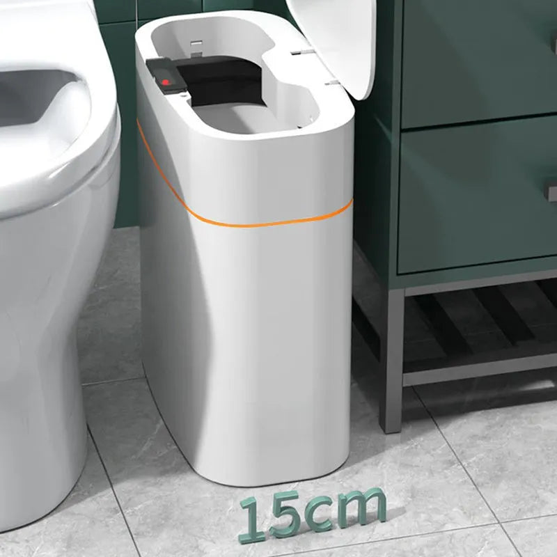 White automatic smart trash can with sensor lid on a kitchen floor.