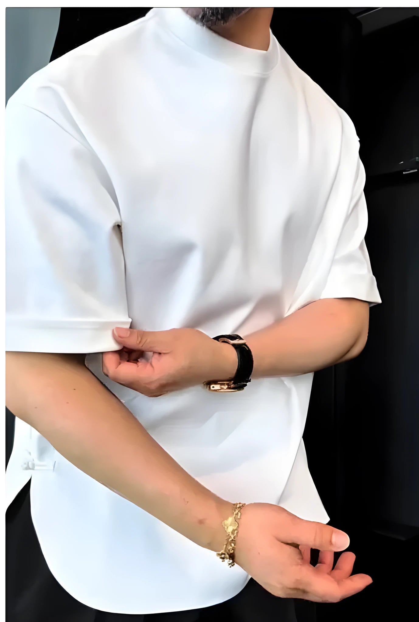 White men's t-shirt with a distinctive buttoned round hem on a regular fit model.