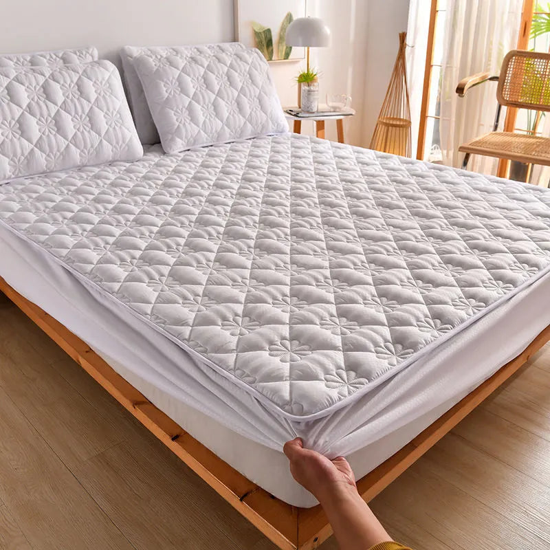 Brushed fabric mattress dust cover fitted sheet in Chrysanthemum colour on a single bed