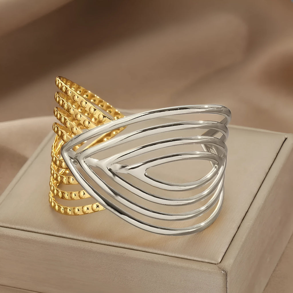 Stainless steel bracelet with lotus ring and glossy stripes, ellipse and line design, electroplated finish