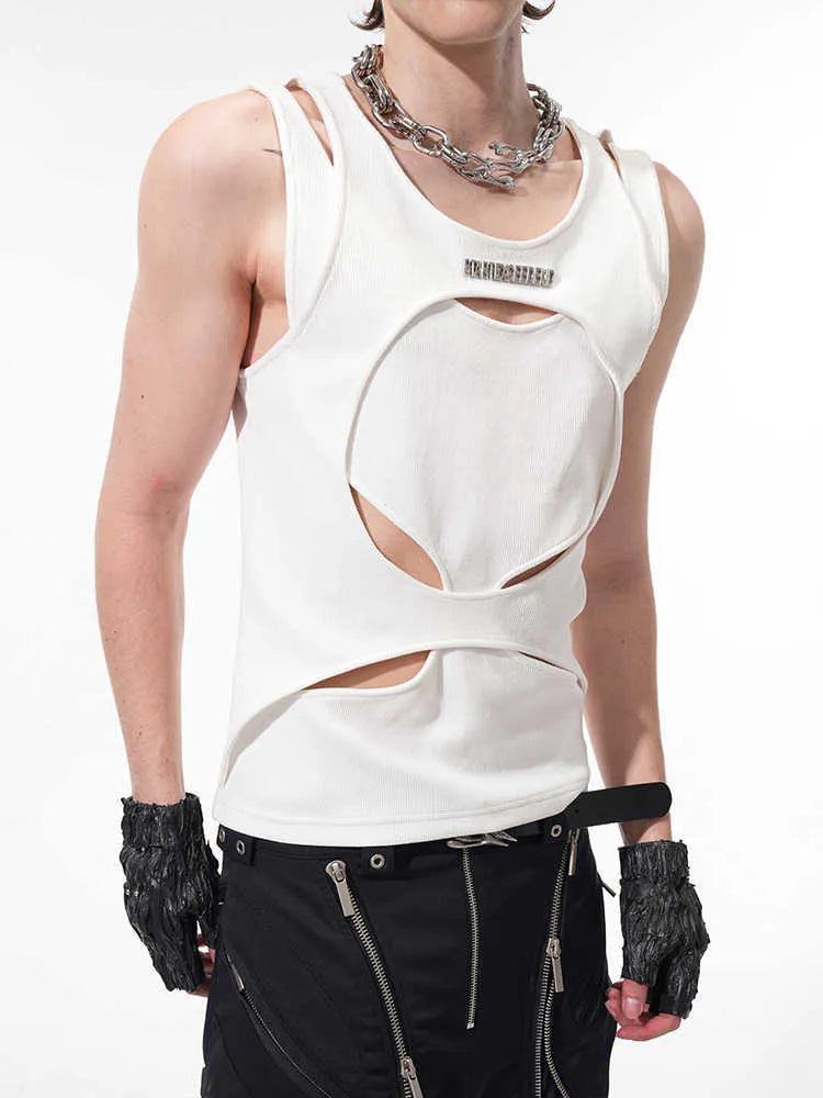 Man wearing a black sleeveless pullover waistcoat with a round neck, showcasing the loose fit and hollow thread texture.