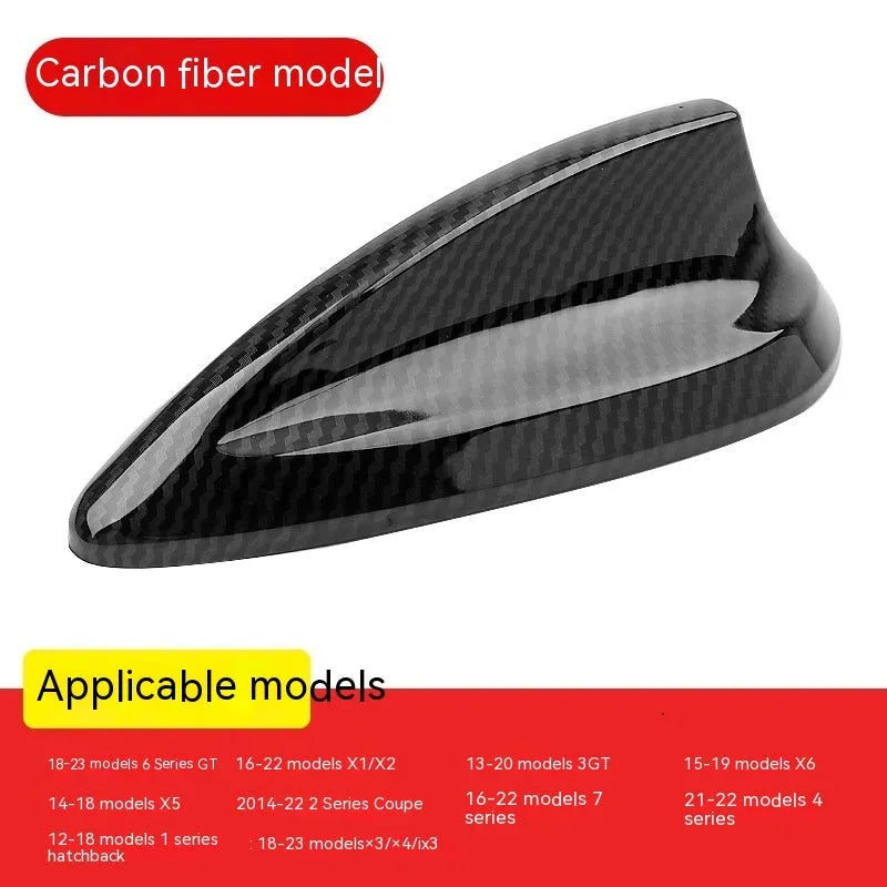 BMW shark fin antenna cover in carbon fibre and piano black finishes for Types A, B, and E.