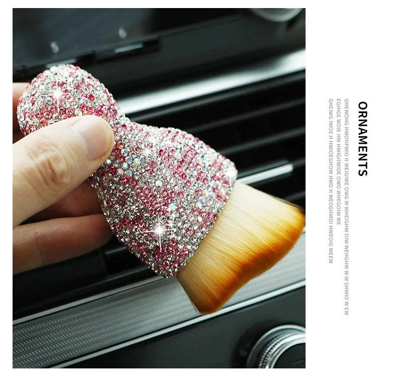 Compact white PVC soft-bristle brush for cleaning car dashboard vents and interior dust.