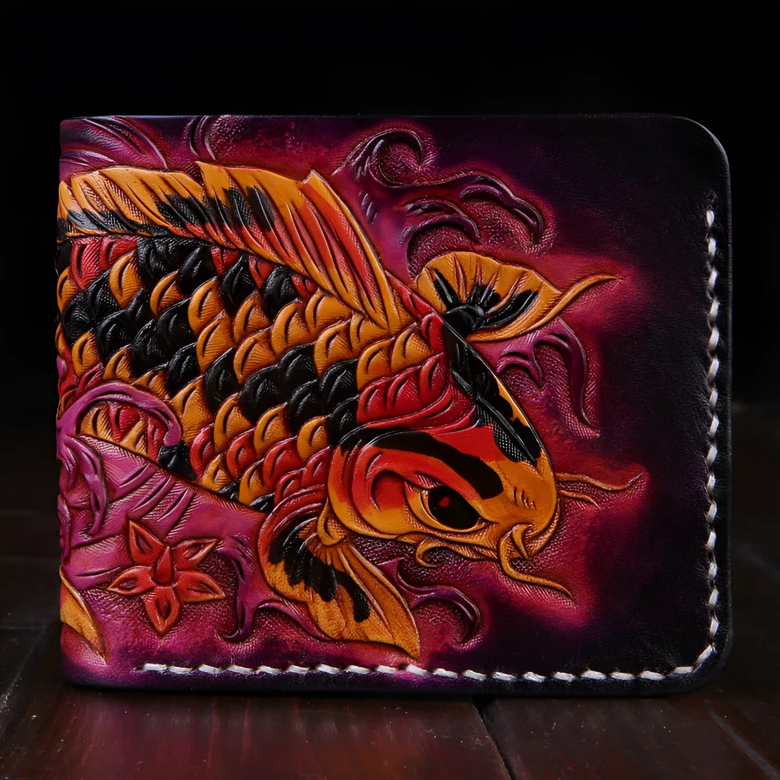 Hand-carved genuine cow leather men's short wallet in red, showing compact 10x12cm size and open bifold design.