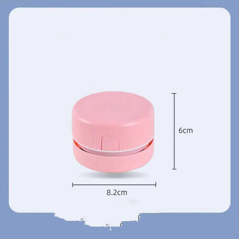 Pink and blue mini handheld desktop vacuum cleaner for pencil shavings and fine debris