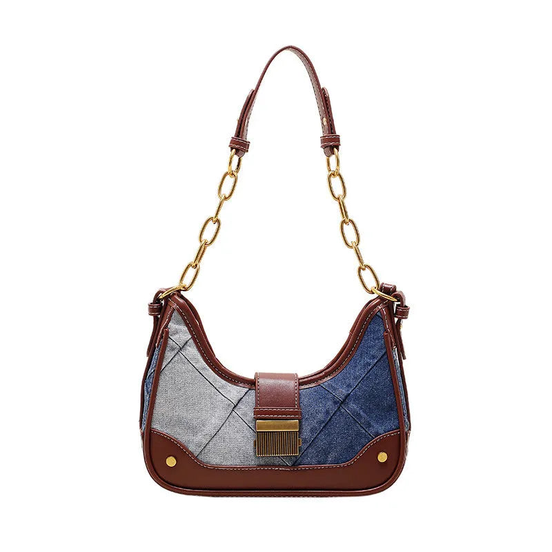 Brown soft denim women's shoulder bag with diamond mesh and chain details, showing bucket shape.