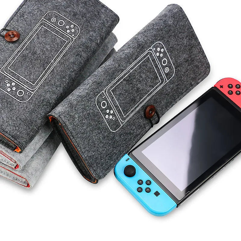 Black felt pouch case for Nintendo Switch console, showing game card slots and double layer storage design.