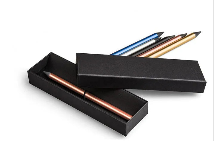 Silver Inkless Metal Pen with 0.5mm alloy tip, spare nib, and leather pen bag on wooden desk.