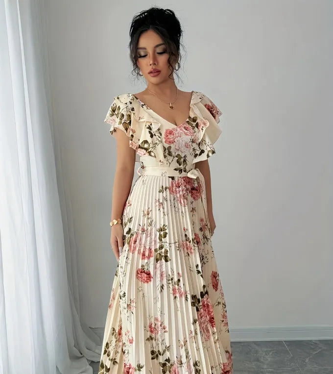 Apricot floral print V-neck dress with ruffle sleeves and a long swing skirt.