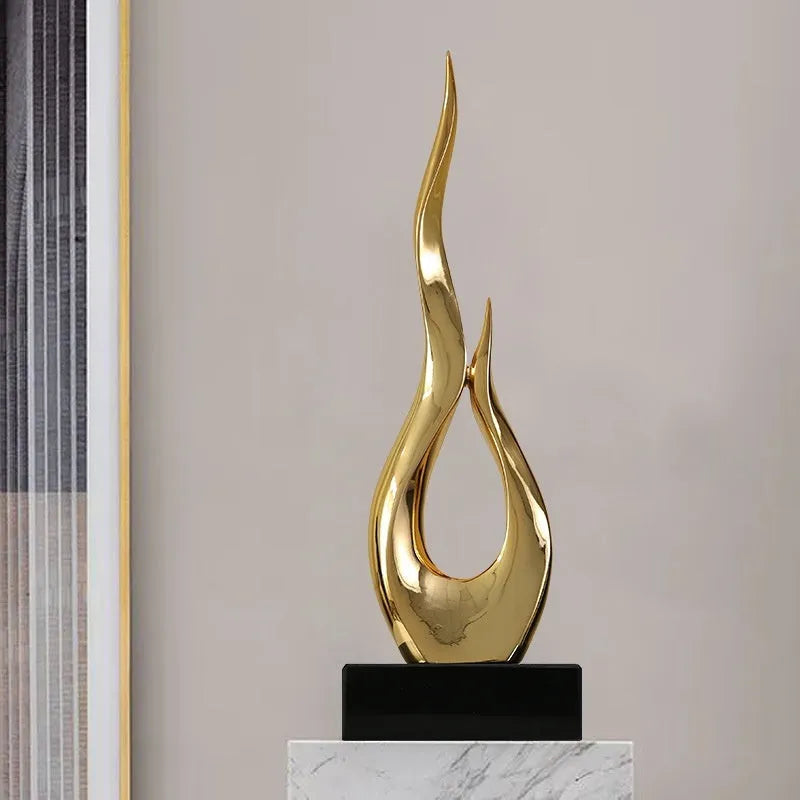 Modern resin festival decoration in gold finish with handmade craft elements