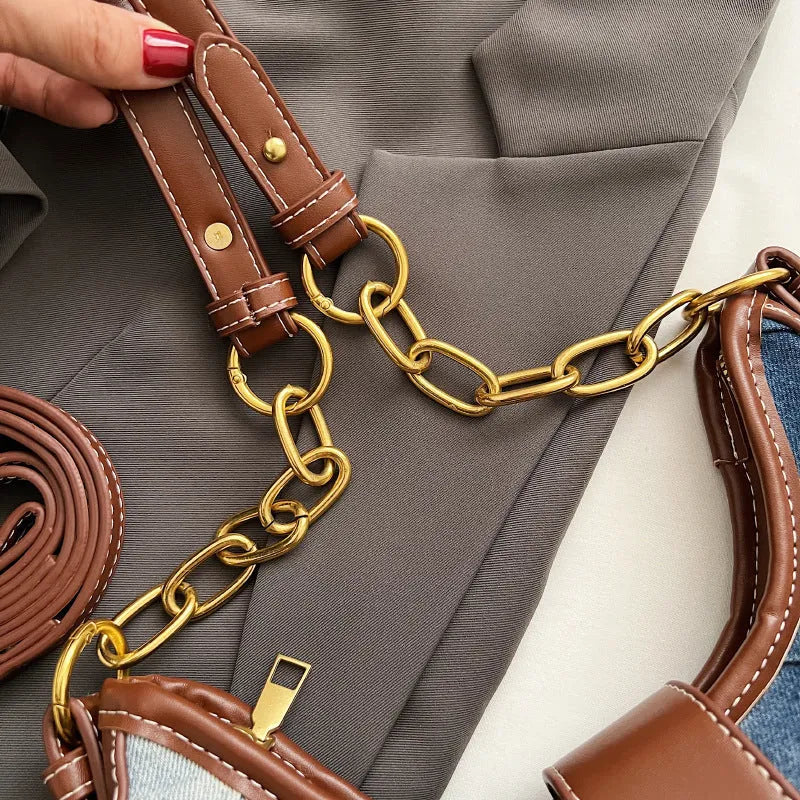 Brown soft denim women's shoulder bag with diamond mesh and chain details, showing bucket shape.