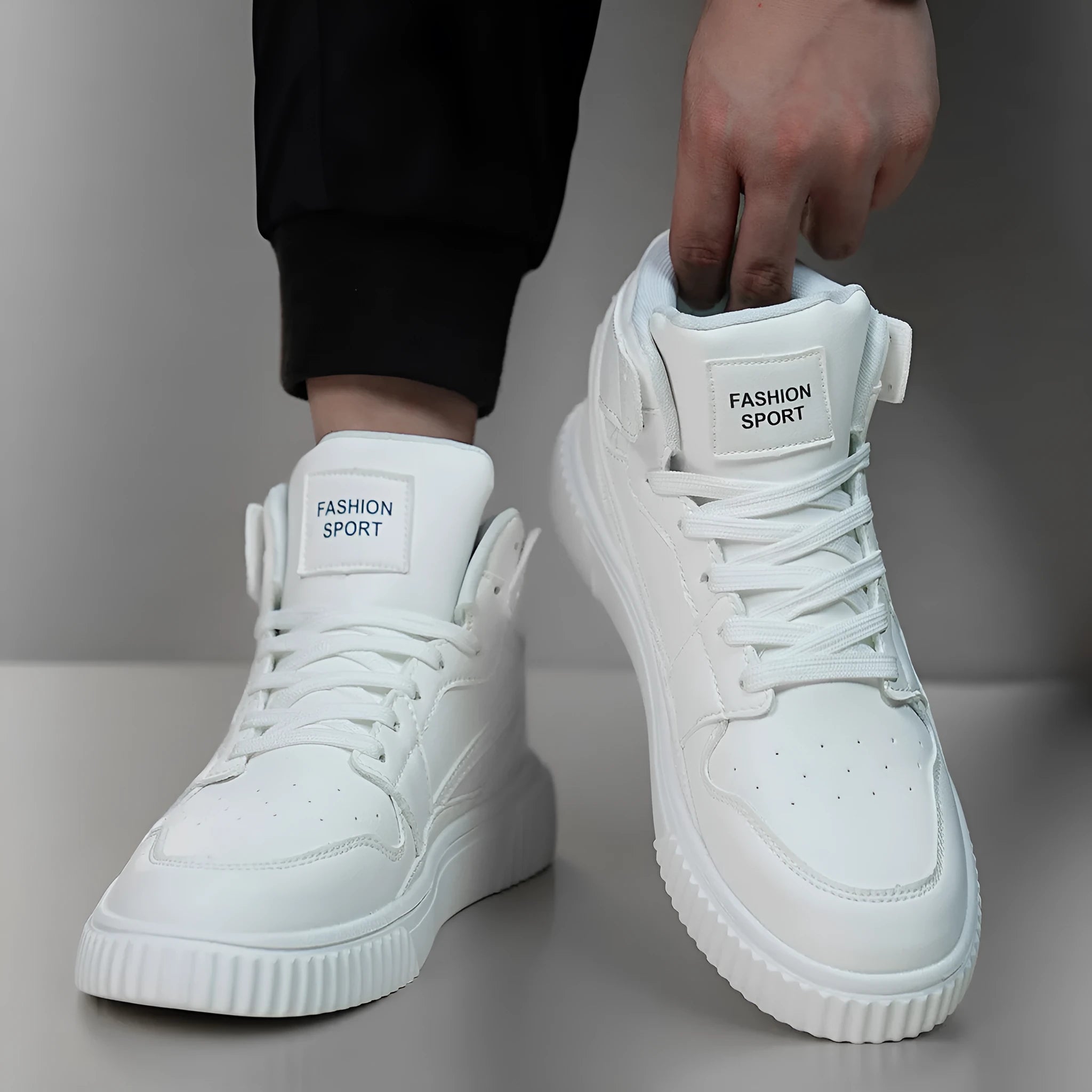 Men's solid white casual shoe with a round toe and smooth microfiber upper.