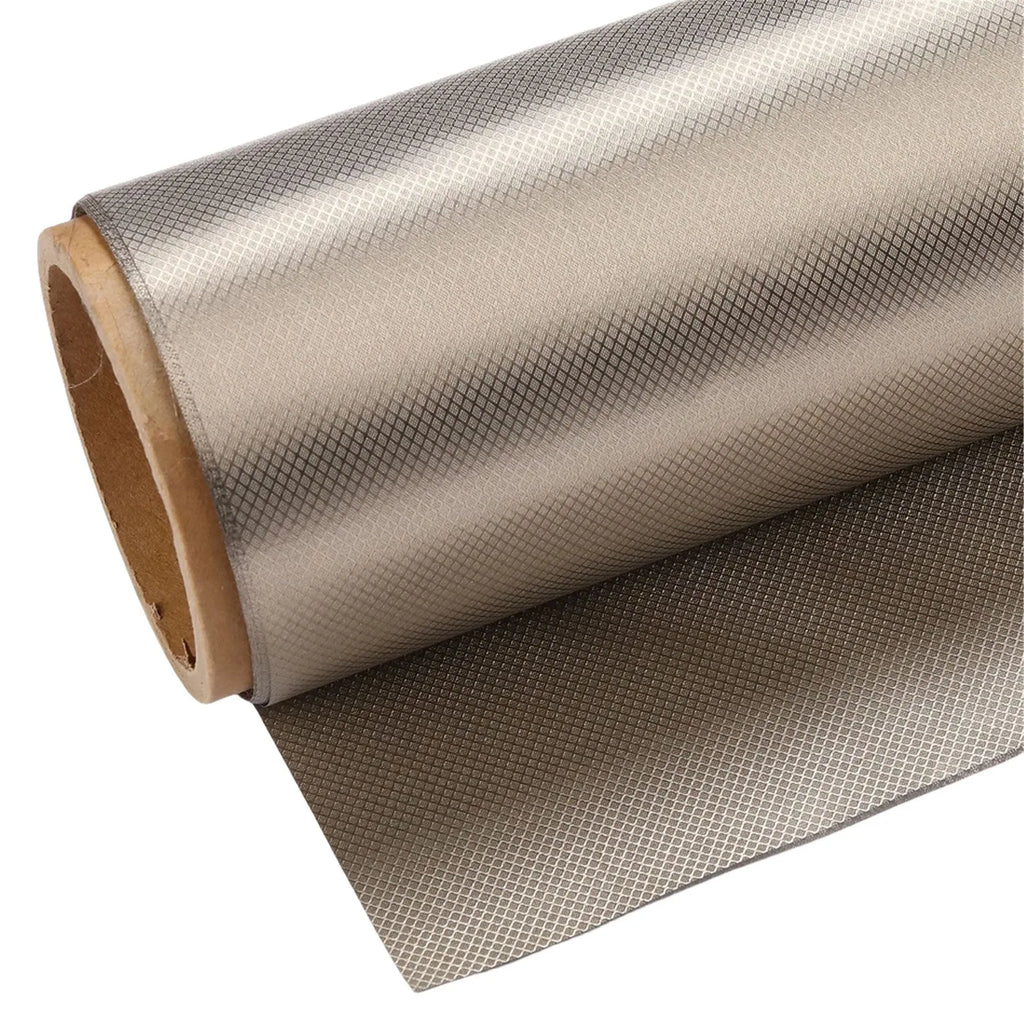 Grey diamond lattice pattern signal shielding fabric with copper and nickel weave.