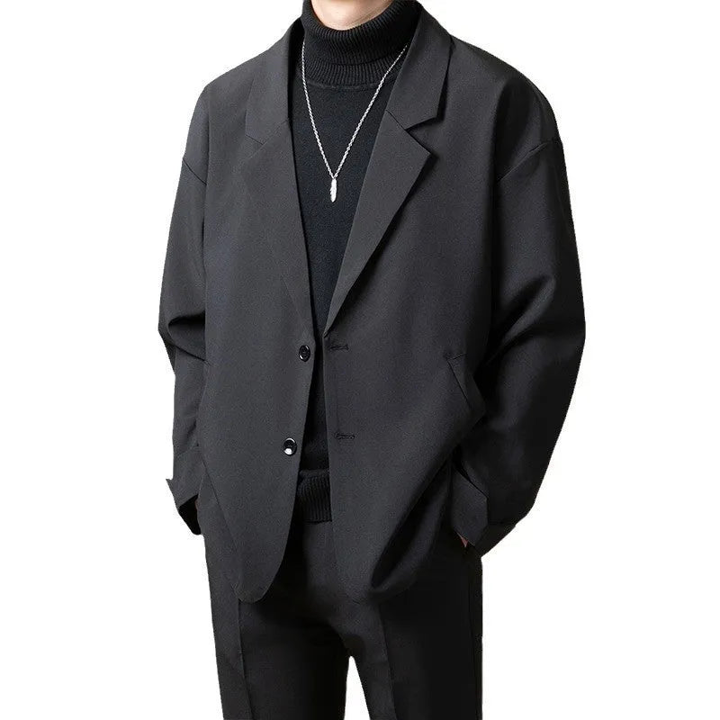 Men's loose fit casual suit jacket in apricot colour on a hanger.