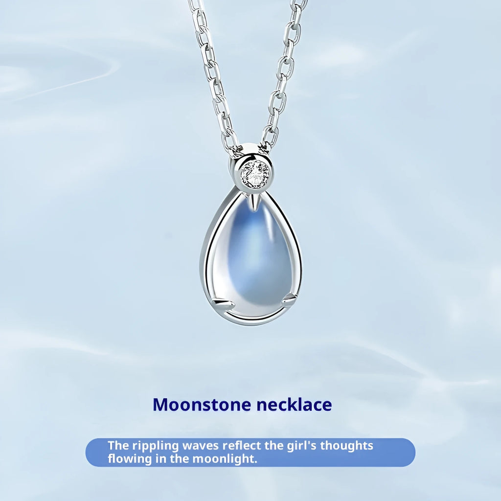 Women's 925 sterling silver moonstone necklace with adjustable chain on a neutral background