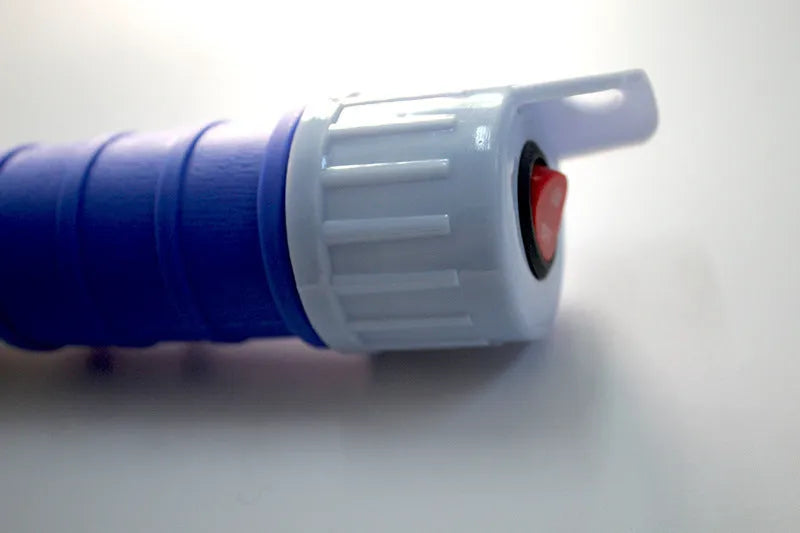 Blue and red manual hand siphon pump for fuel and liquid transfer