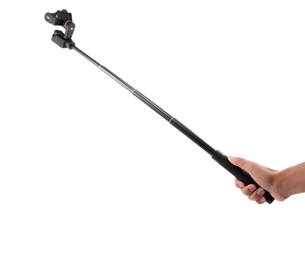 Black retractable aluminium selfie stick with Bluetooth remote, extended with a phone in the holder.