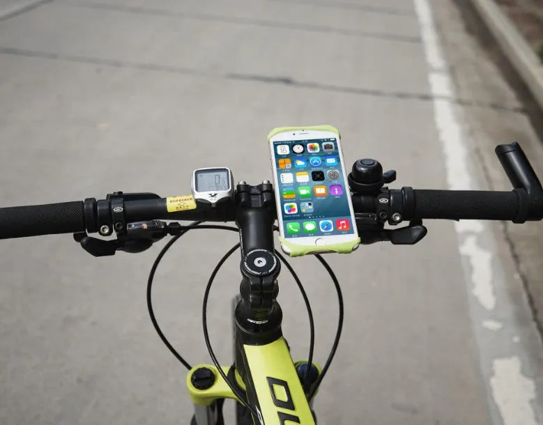 Adjustable silicone bicycle phone holder mounted on handlebar with smartphone secured