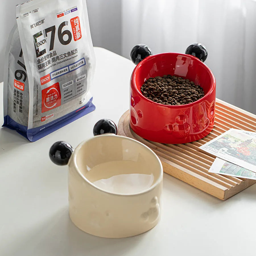 Ceramic high-footed double pet bowl with tilted stand for cats and dogs, in red or white