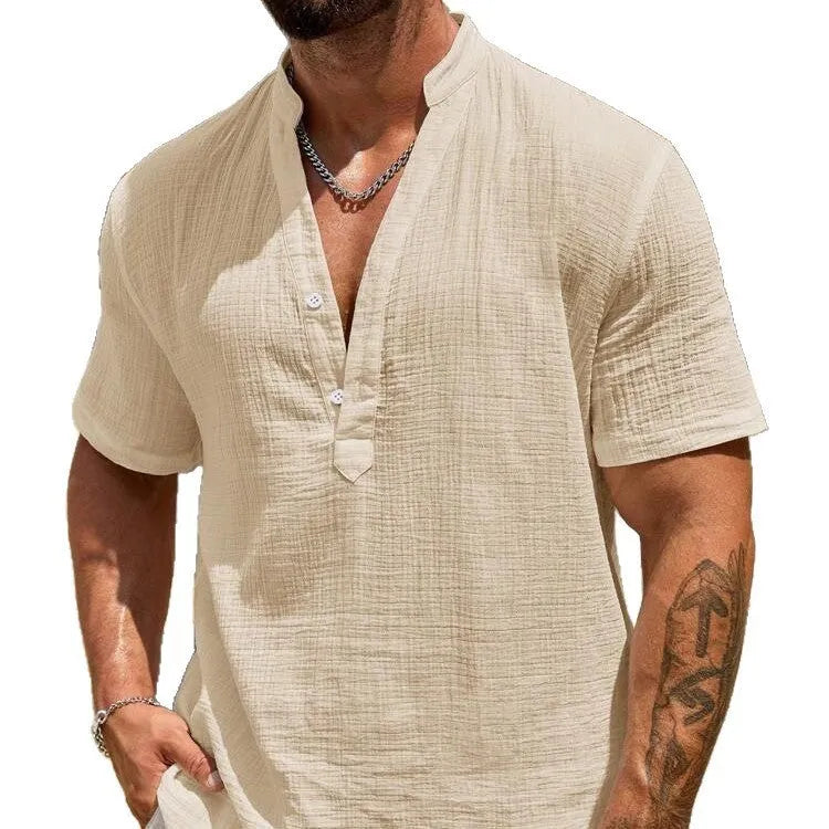 Men's solid colour short-sleeve casual shirt with stand collar on a hanger.