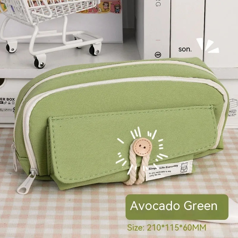 Green Korean style canvas pencil case open showing pen storage capacity