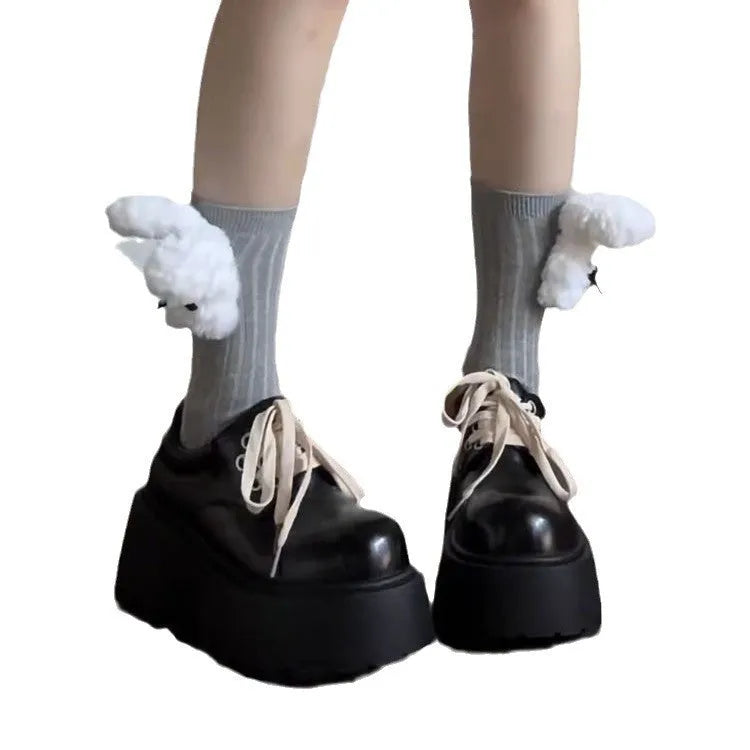 Matte black women's lace-up ankle boots with a chunky 8cm heel and buckle.