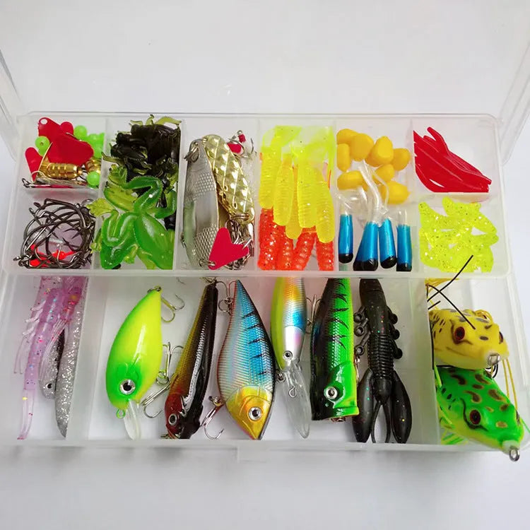 Assortment of hard plastic minnow fishing lures with sequins, hooks, and tackle components from a 142-piece kit