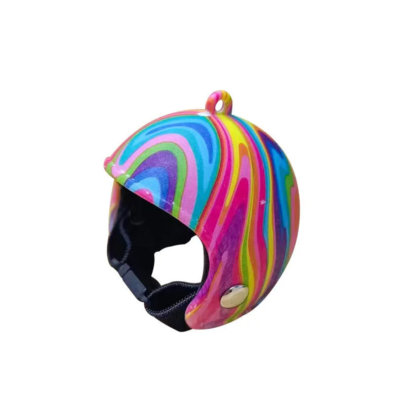 Small plastic chicken pet helmet in one of twelve designs including rainbow, plaid, or smiling face.