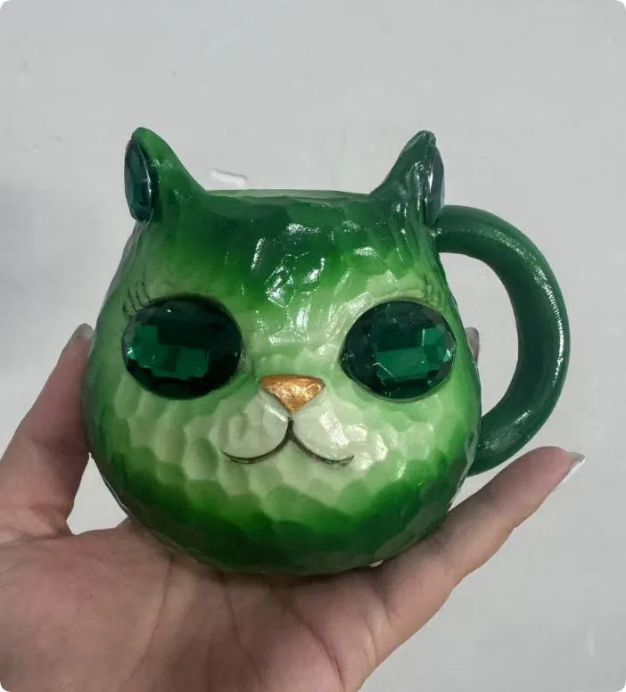 American-style cat cup resin craft ornament in purple, green, blue, and pink colours.