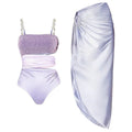 Purple one-piece swimsuit with a matching wrap skirt on a mannequin.