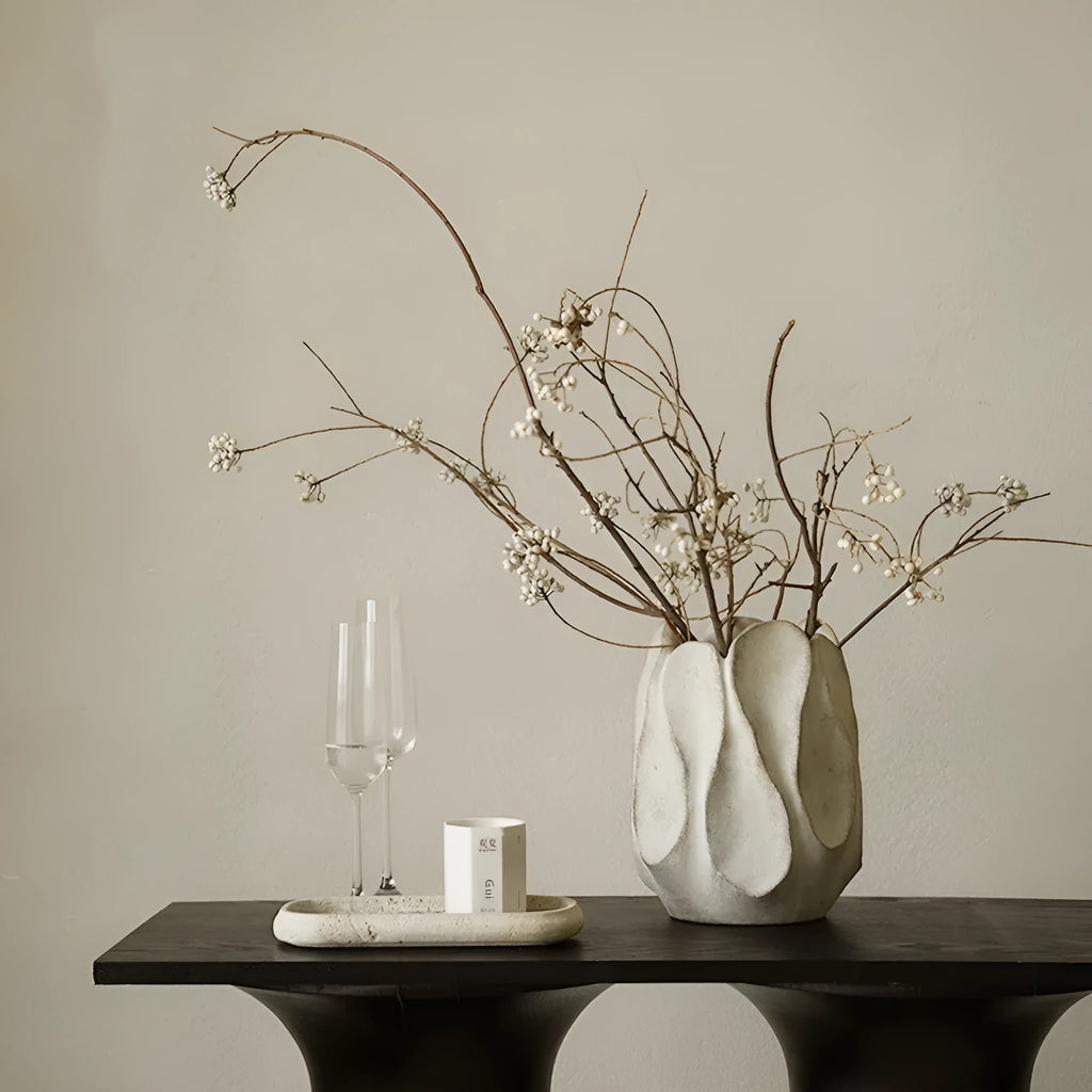 Irregular shaped ceramic vase for flower arrangements in art style with high and low versions