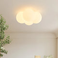 Modern cloud-shaped chandelier with 4 lights and minimalist design for bedroom ceiling mounting