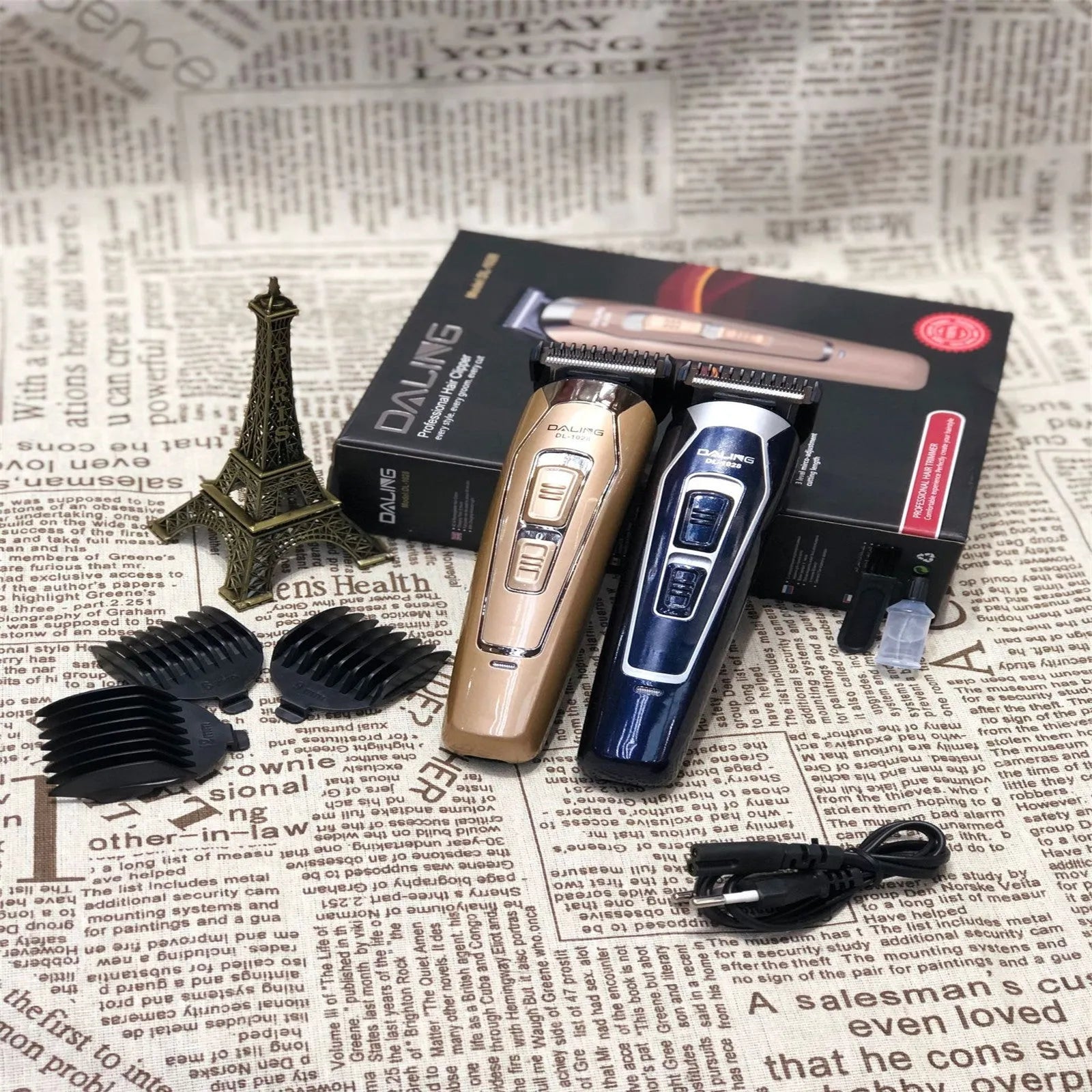 Dark blue electric hair clipper with stainless steel blades and rechargeable battery for home grooming