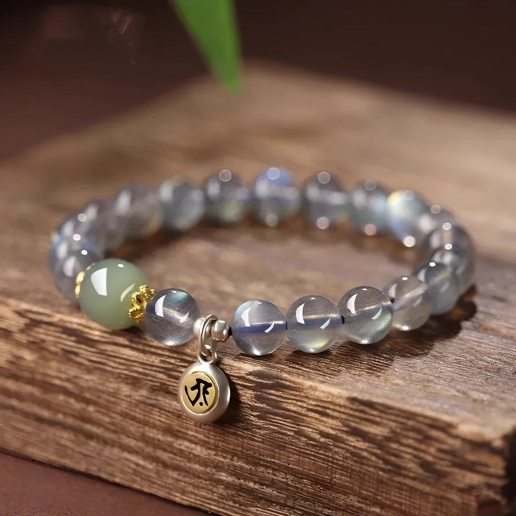 Moonstone women's bracelet with 8mm beads showing Thousand-Hand Guanyin Mouse zodiac design