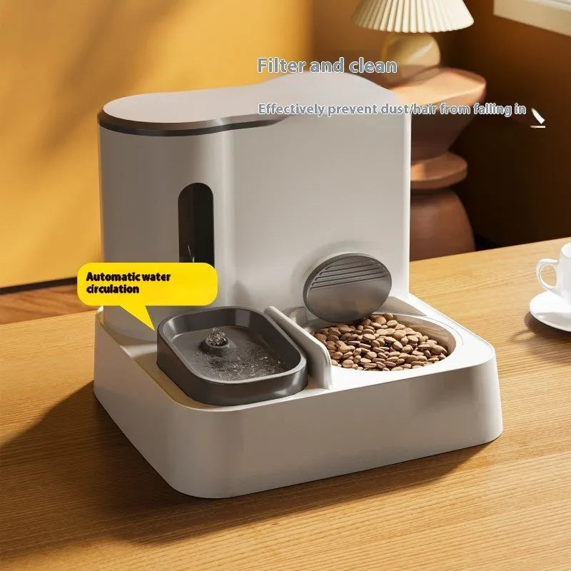 Automatic cat feeder with integrated water dispenser showing dual bowl design for food and water