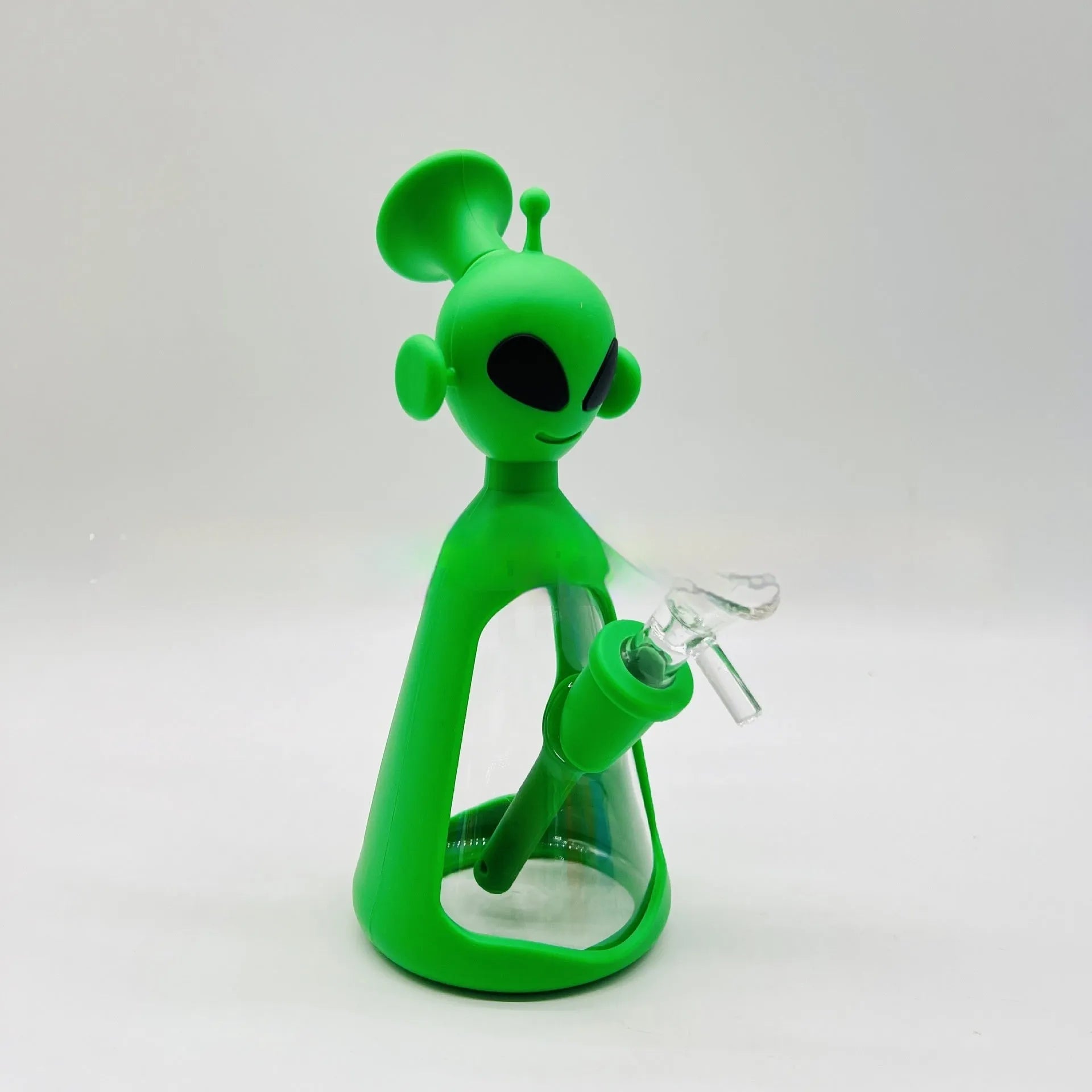 Glass silicone cigarette pipe with clear bowl and blue silicone mouthpiece on white background