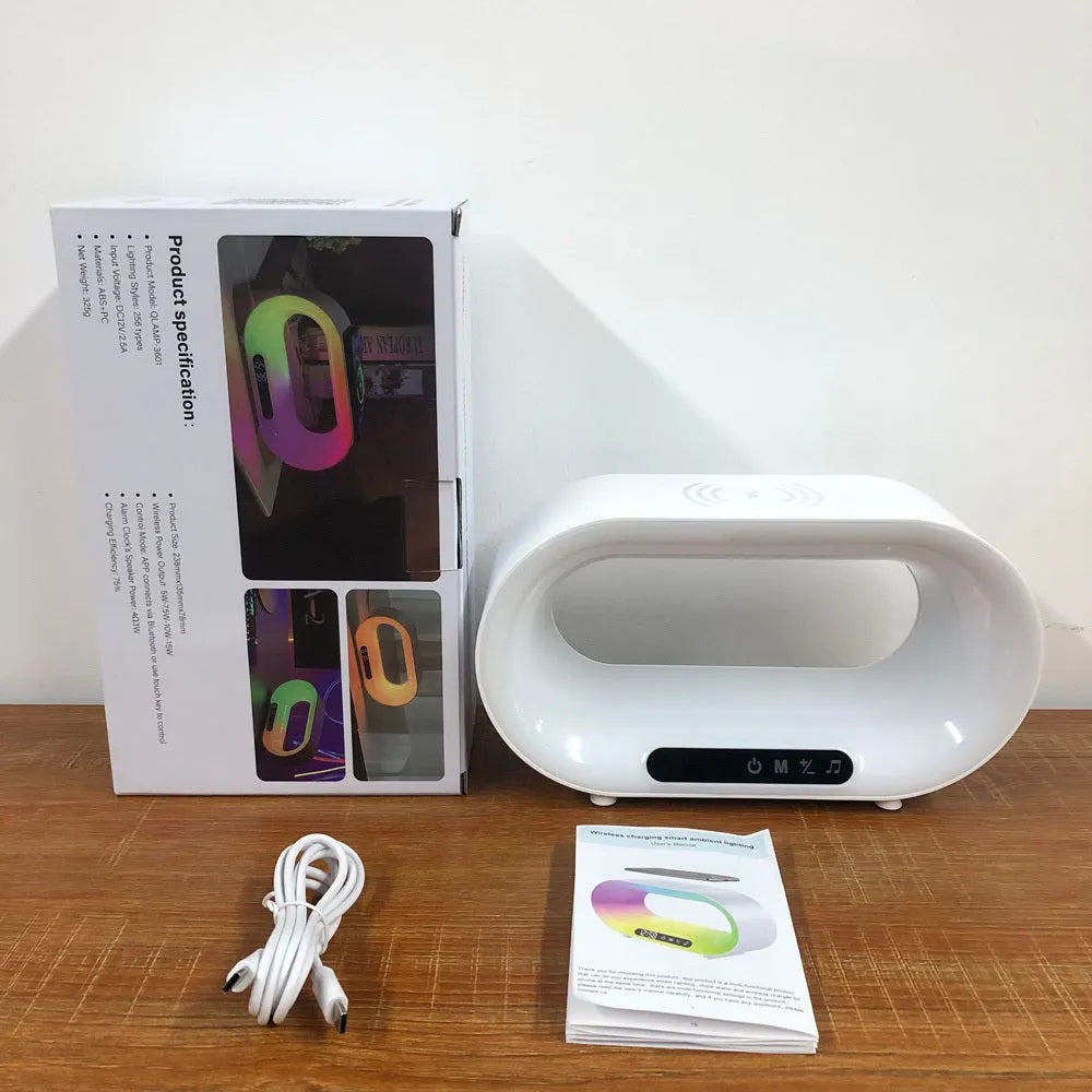 White smart desk lamp with wireless charging pad, alarm clock display, and RGB lighting measuring 23.8 x 7.8 x 13.5 cm