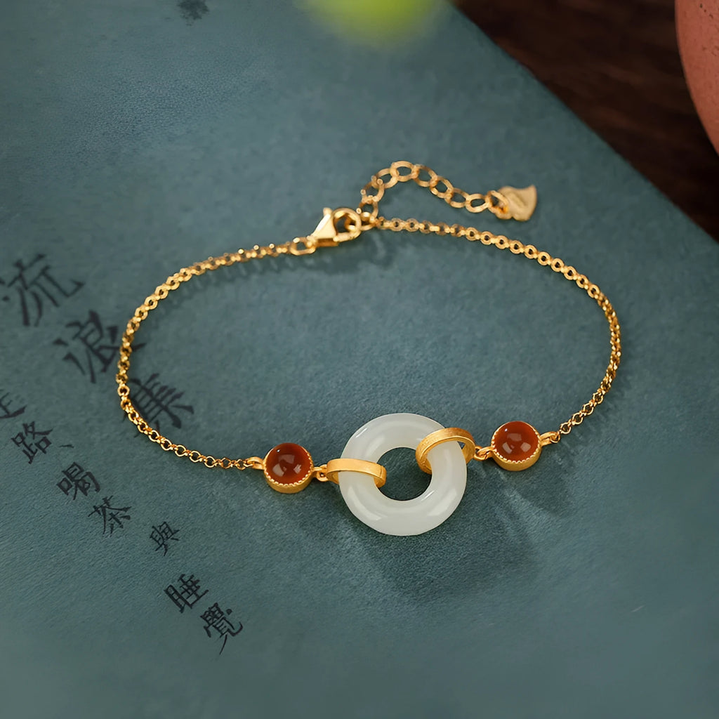 S925 sterling silver gold-plated bracelet with natural Hetian jade peace symbol buckle and adjustable clasp
