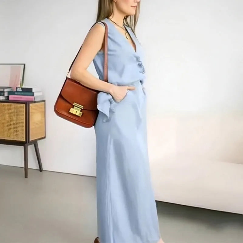 Women's casual sleeveless vest and long skirt two-piece suit in blue, yellow, or white polyester.