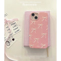 Pink soft TPU iPhone case with three-dimensional pearl dot bow, compatible with iPhone 11 to 15 Pro Max.