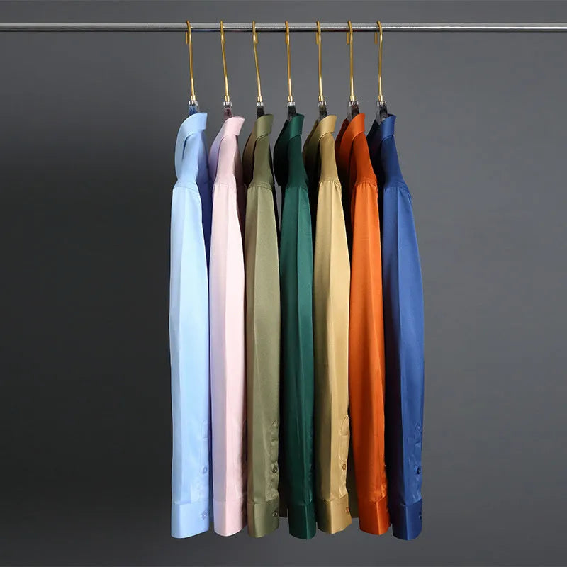 Men's loose fit long-sleeved non-ironing shirt in a solid colour, made from breathable polyester spandex fabric.