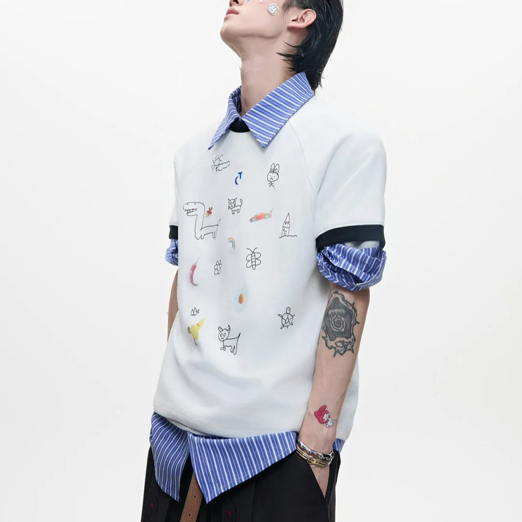 Man wearing a blue loose fit short sleeve shirt with a cartoon print design.