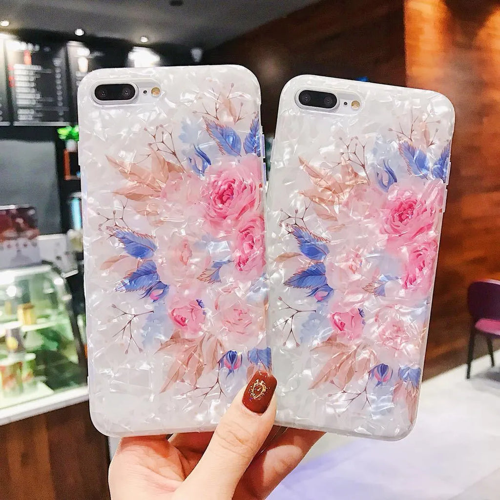 Dream Shell soft TPU iPhone case shown in brown, purple and white colours for multiple iPhone models.