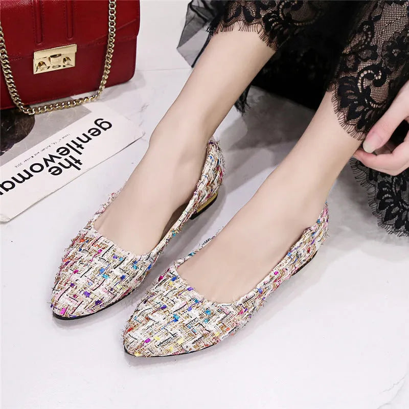 Women's black and white casual canvas shoes with pointed toe and low-cut design