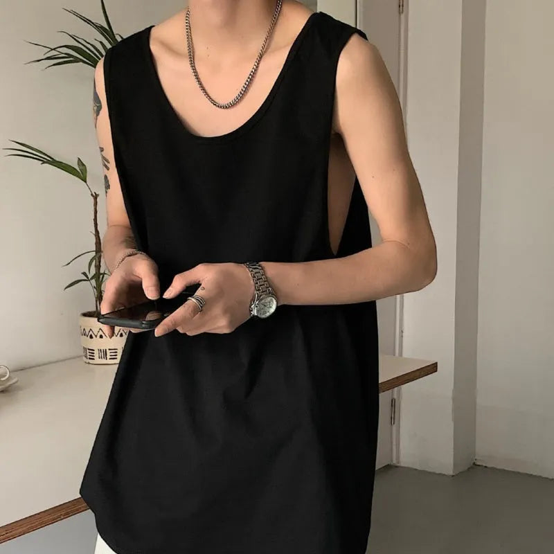 Sleeveless vest in solid colour, loose fit, polyester blend, straight hem, available in black and white for summer casual wear