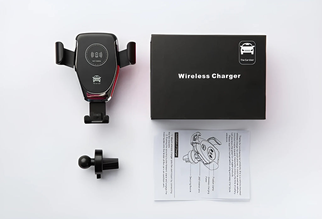 Black car wireless charger with automatic arms, mounted on a car air vent, charging an iPhone.