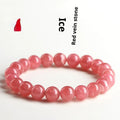 Women's crystal bracelet with a longevity lock clasp and geometric beads in rhodochrosite colours.
