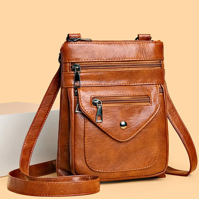 Vertical crossbody phone bag for women in square shape with visible sewing lines