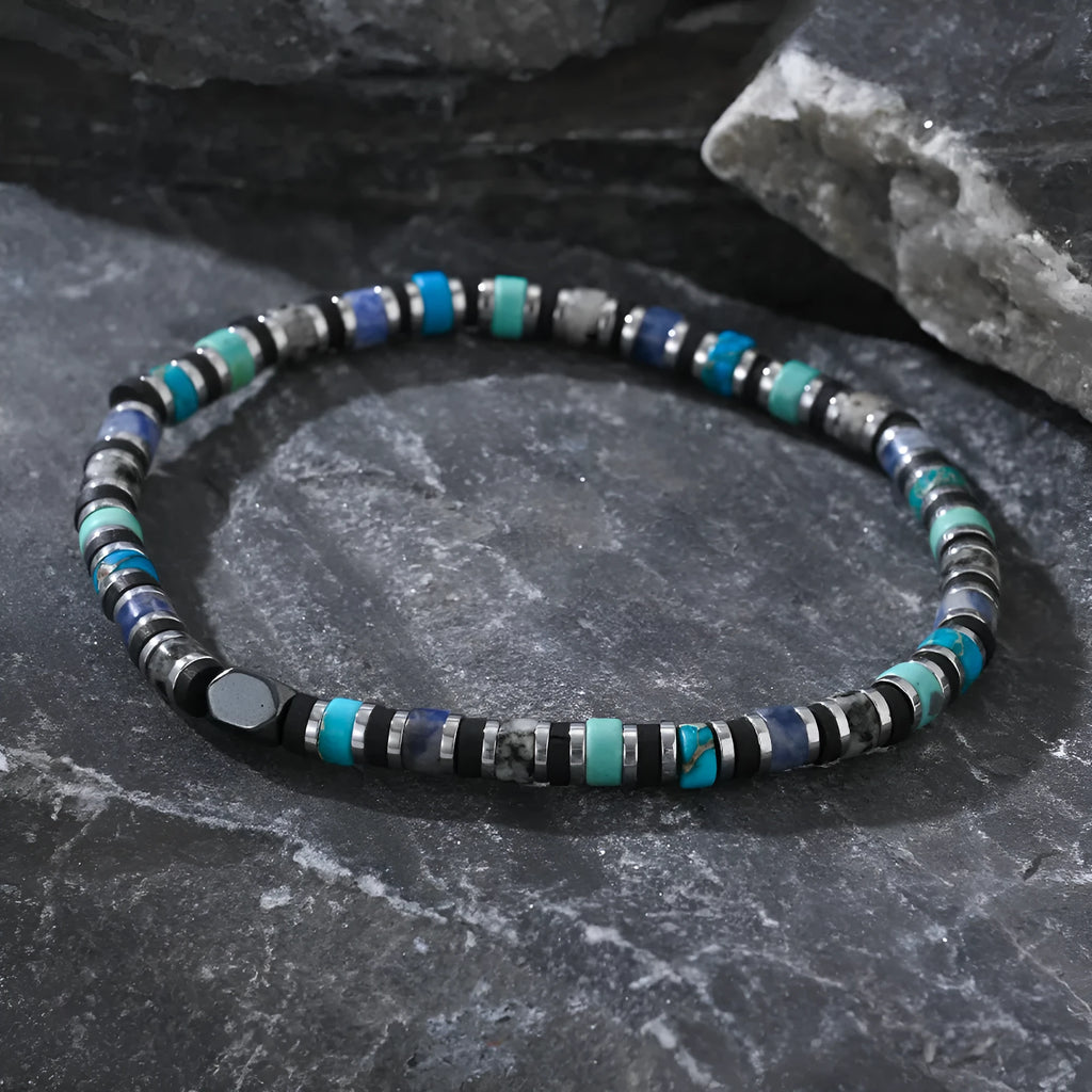 Hand-woven cylindrical bracelet made from natural semi-precious stones in a Bohemian style.